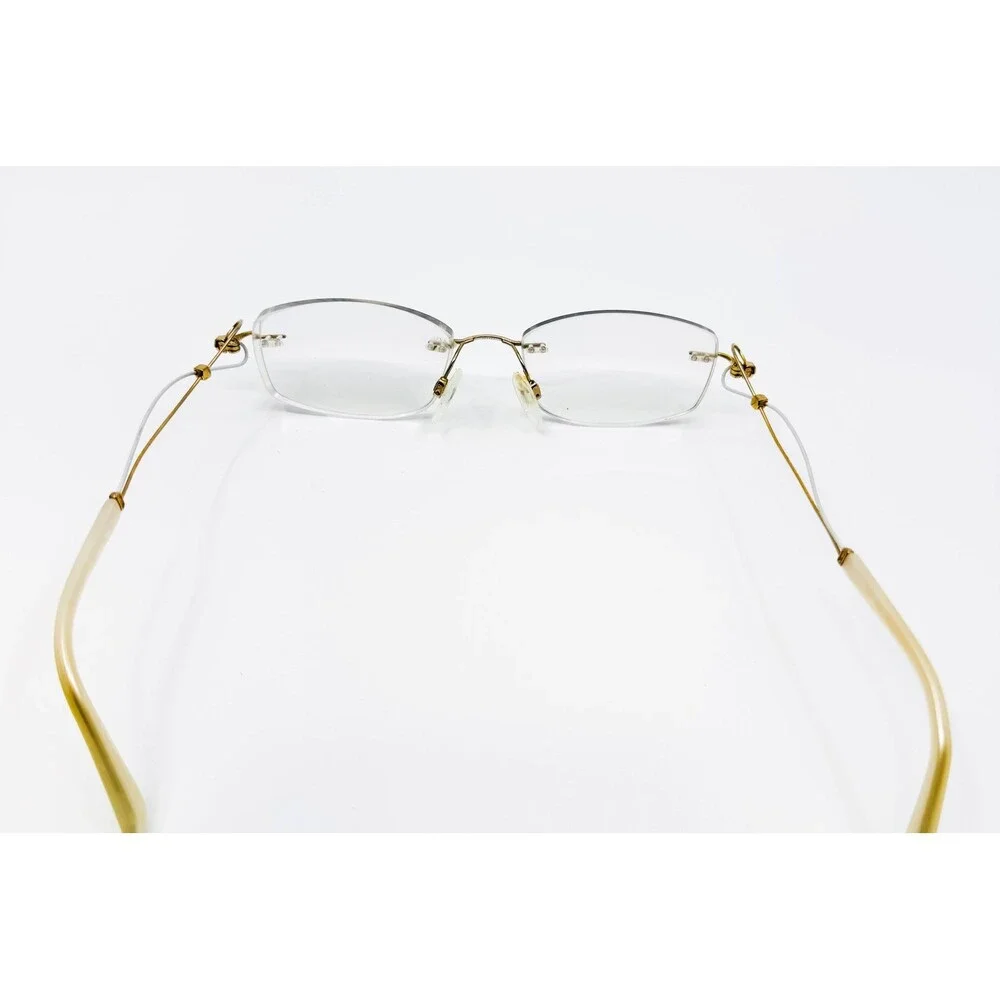 Charmant Line Art Eyeglasses Womens Gold Rimless XL2063 Titan 51-17-135 43019